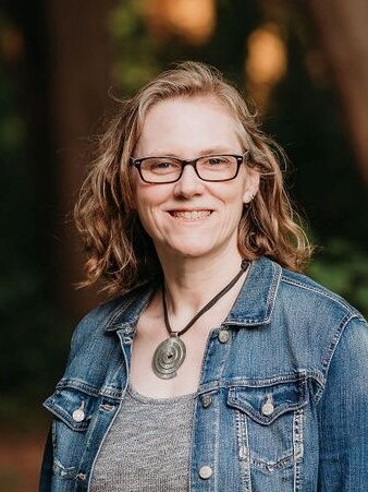 Portrait of Angela Hammond, CW Pride Youth Engagement Coordinator.